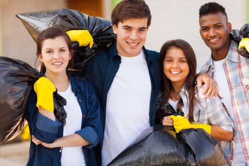 Workers sorting recyclable building materials